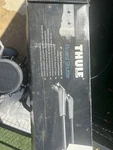 Thule Board Shuttle Surf/sup Carrier Roof Rack Accessory. Fixed Price $25.00.