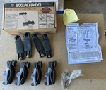 Yakima #03590 Universal Cross Bar Roof Rack Mighty Mounts (set 4) New. Fixed Price $30.00.