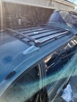 2000-2004 Subaru Legacy Outback Roof Rack Cross Set Black Oem. Fixed Price $60.00.