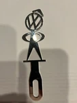 Vw Beetle Vintage Metal Man Highly Polished Silver License Plate Attachment. Fixed Price $65.00.