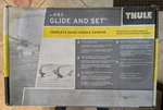 New Thule 883 Glide And Set Kayak Saddle Carrier In Box. Fixed Price $85.00.