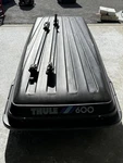 Four 600 Roof Cargo Box Carrier With Mounting Hardware, Black Vintage Hardshell. Fixed Price $299.00.