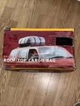 Axius Vehicle Rooftop Cargo Bag. Fixed Price $39.99.