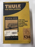 Thule C34 Clamp-ons. Fixed Price $10.00.