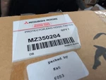 Genuine Mitsubishi Hood Protector Dark Tint MZ350204. Fixed Price $97.75.