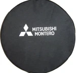Sparecover Brawny Series Mitsubishi Montero Tire 31" Black Denim New. Fixed Price $95.00.